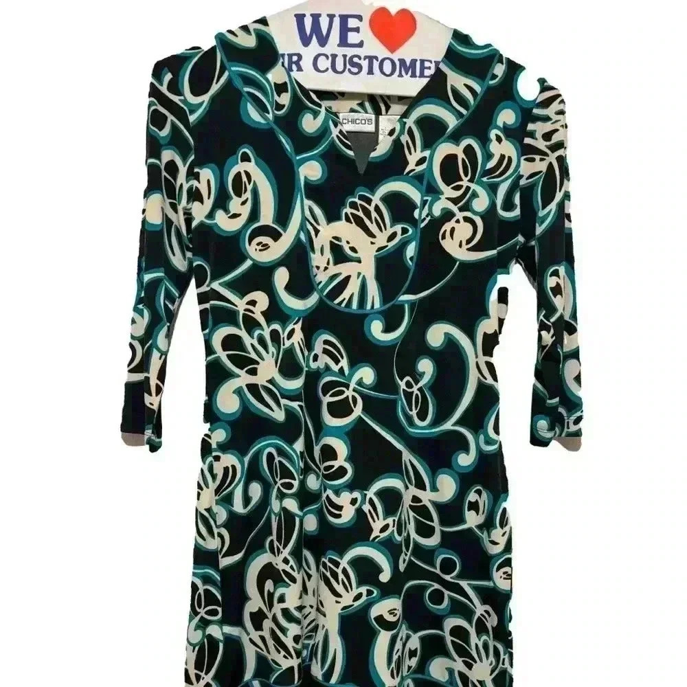 Chico’s women’s black and teal dress with swirl design.  Size 0